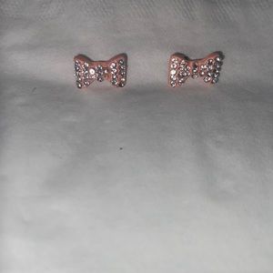Pink ribbon earrings with diamonds
